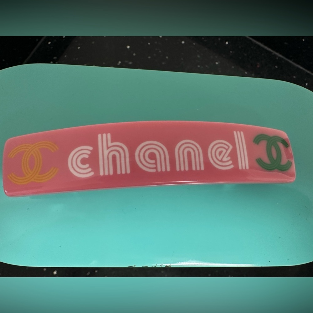CHANEL Pink Logo Hair Clip with Gold and Green Accents-Authentic. Never worn